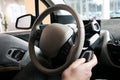 The man`s hand on the steering wheel Royalty Free Stock Photo