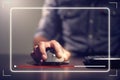 Man\'s hand using computer optical mouse to browse online media