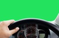 Man's hands of a driver on steering wheel of a minivan car on as