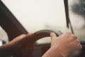 Man`s hands driving