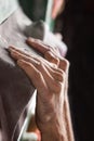 Man`s hands on handhold on artificial climbing wall Royalty Free Stock Photo