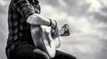 Man`s hands playing acoustic guitar, close up. Acoustic guitars playing. Music concept. Black and white Royalty Free Stock Photo