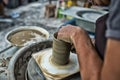 Man`s hands. Potter at work