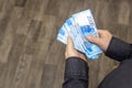 Hands recount rubles cash money