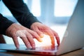 Man`s hands are using a computer notebook to Searching for information Royalty Free Stock Photo