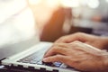 Man`s hands using laptop with copy space on blur Royalty Free Stock Photo