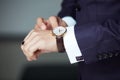 Man`s hands with watches close-up