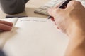 Man`s hands writing in a notebookh Royalty Free Stock Photo