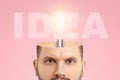 In the man`s head, an incandescent lamp symbolizes an idea. The concept is a fresh look, a new idea, a creative solution, thinkin