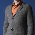 Man`s knitted jacket. Mens fashion designer clothes close up