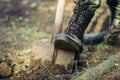 A man`s leg in a military boot