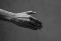 A man's right hand with shake hand gesturing with nobody, black and white style. Royalty Free Stock Photo
