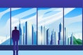 A man`s silhouette stands at the glass in the office and admires the dawn in the city. Royalty Free Stock Photo