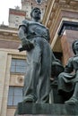 Man\'s statue. Monument to students by Moscow State University named after Lomonosov, main building.