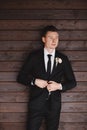 Man`s style. Elegant young man. Close-up portrait of the man in a luxury classic trendy suit. portrait of the groom