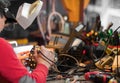 Man with safety glasses repairing motheboard with soldering iron