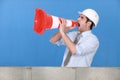 Man in safety hat screaming Royalty Free Stock Photo