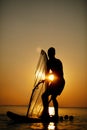 Man sailboarding at sunset Royalty Free Stock Photo