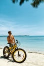 Man With Sand Bike On Beach Enjoying Summer Travel Vacation Royalty Free Stock Photo