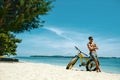 Man With Sand Bike On Beach Enjoying Summer Travel Vacation Royalty Free Stock Photo