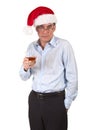 Man in Santa Hat Holding Drink