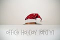 Man with santa hat and text office holiday party