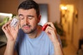 Man saving his tears in a bottle Royalty Free Stock Photo