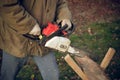 Man sawing a board