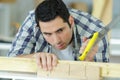 man sawing cutting wood board Royalty Free Stock Photo