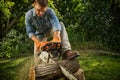 Man sawing a log