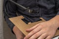 a man sawing a wooden detail with a jigsaw. wood cutting at home Royalty Free Stock Photo