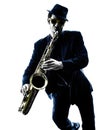 Man saxophonist playing saxophone player silhouette