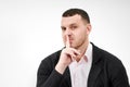 Man saying hush and be quiet with finger on lips gesture looking at camera Royalty Free Stock Photo