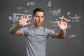 Man scientist or student working with various high school maths and science formulas. Royalty Free Stock Photo