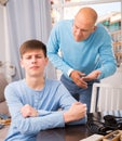 Man scolding son at home Royalty Free Stock Photo