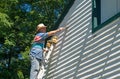 Man Scraping Peeling Paint Royalty Free Stock Photo