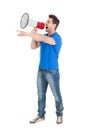 Man Screaming Into Bullhorn While Pointing Away Royalty Free Stock Photo