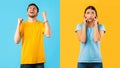 Man screaming with raised fists, scared woman covering ears Royalty Free Stock Photo