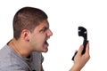 Man Screaming Into the Telephone Royalty Free Stock Photo