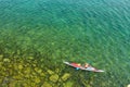 The man in a sea kayak on the lake Baikal Royalty Free Stock Photo