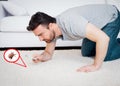 Man checking for carpet dust mites and bug parasites Royalty Free Stock Photo