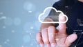 A man is searching for information on cloud computing technology to use. Touching the cloud icon on the right with a fingertip. Royalty Free Stock Photo