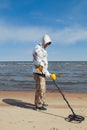 Man searching for a precious metal Royalty Free Stock Photo