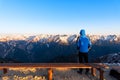 A man is seeing the scenery of Mount Tsubakuro Dake at sunset. Snow mountain range of Norther Japan Alps Chubu-Sangaku Park Royalty Free Stock Photo