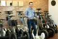 Man with segways at rental agency