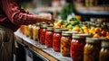 Man selecting jar of pickled vegetables at market