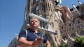 Man with selfiestick in city church