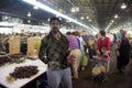 Man selling berries