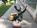 Man selling coconuts
