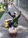 Man selling coconuts